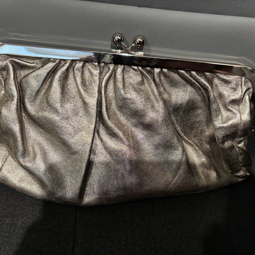 Express Elegant Silver Clutch Bag-  color is silver with hints of gold